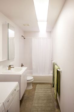 The back module contains two bedrooms and two baths. Long, back-to-back bathrooms provide ample storage and block sound between the two bedrooms.