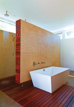 This award-winning master bath’s combination of geometric tiles and smooth lengths of wood slats creates plenty of visual interest without disrupting the space’s calming natural palate.    
Project: Appleton Living Master Bath, Venice, Calif.; 
Builder: Core Construction and Development, Los Angeles; 
Architect: MINARC, Santa Monica, Calif.