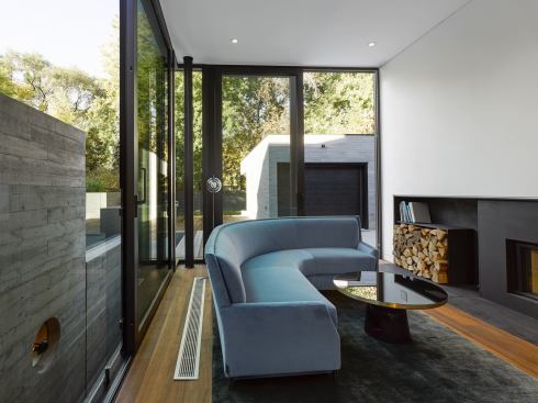 The first-floor living area. Instead of a single large family room, the house offers a variety of smaller gathering places at basement, first floor, and second floor.