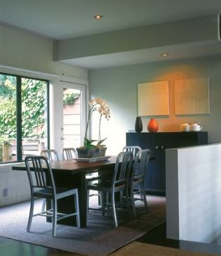 On this open plan second floor, the dining area is a part of the living area.