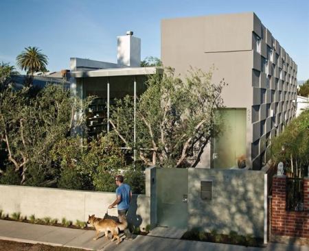 The sculptural north façade of this  home creates a play of shadow and light, so the structure looks distinctly modern but not cold.     
Project: Private Residence, Venice, Calif.; 
Architects: Trevor Abramson and Douglas Teiger