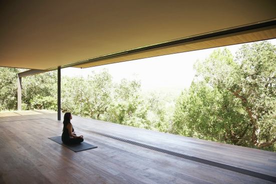 Deep overhangs shade the south-facing deck in summer and allow for solar gain in winter.