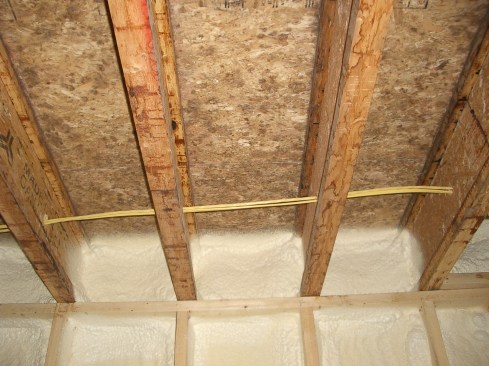 Spray foam makes an effective air seal at the band joist location.