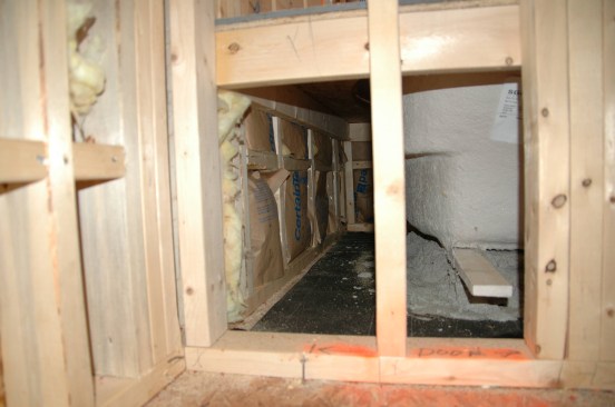 Here, the wall behind a tub has been insulated, but not air-sealed.