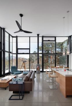 The minimalist interior defers to the scenery outside.