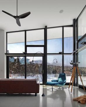 Wood-framed triple-pane windows support both energy efficiency and thermal comfort.