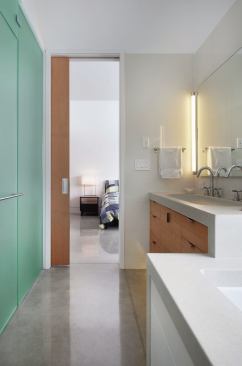 The master bath. Countertops throughout are stone composite.