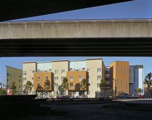 Now it's home to an artful blend of affordable housing units with landscaped courtyards between the buildings. Architect: David Baker + Partners Builder: Nibbi Brothers Developer: The Related Companies of California