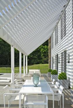 The best panoramas face west, so serious sun protection was in order in the form of a sloped screen.