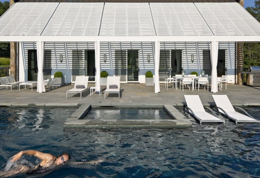 The pool is on the west side of the house, to get the benefit of views and afternoon sun.