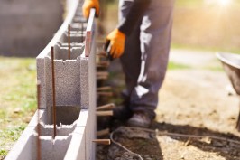 At the world’s largest competition of bricklayers, robots fall short of the speed and precision that the trade requires.