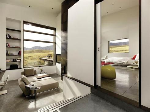 Changes in floor elevation create distance between the study and master bedroom.
