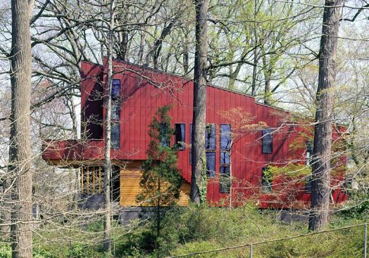 Workaday materials like cement board siding, the cheapest available CMUs, and stock stair and railing parts transcend their humble origins in this inventive home for two.