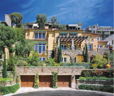 A mechanized drainage system carries water from the roof and terraces into the stair-stepped planters below. Plantings were organized in layers to help screen outdoor spaces from neighbors as well as to mitigate the steepness of the site.