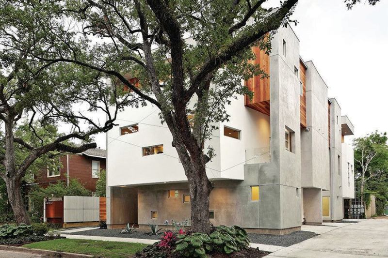 Two trees were saved allowing shade for second-floor patios.