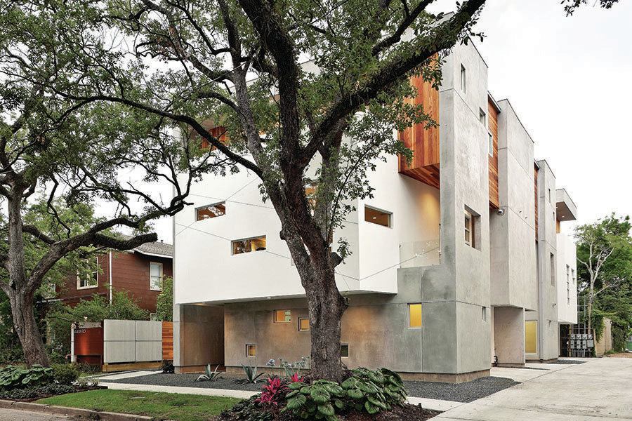 Two trees were saved allowing shade for second-floor patios.
