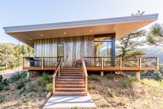 The design team chose an angled roofline with long overhangs to keep the deck cool in the summer and protected from snowfall in the winter.