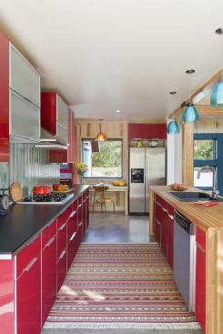 The+slab-on-grade+construction+has+simple+concrete+floors+that+are+warmed+by+radiant+heat.