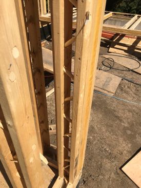 Doweled 2x3 studs create a nominal 6-inch thermally broken wall stud.
