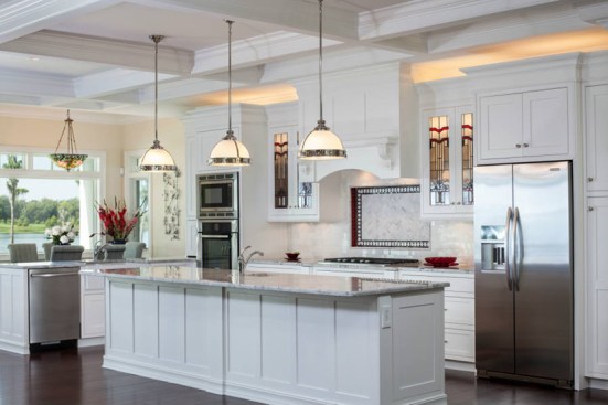 It’s hard to imagine a layout more
open than this one, with the kitchen flowing without interruption into the
dining room, the breakfast nook, and even the more-formal living space.