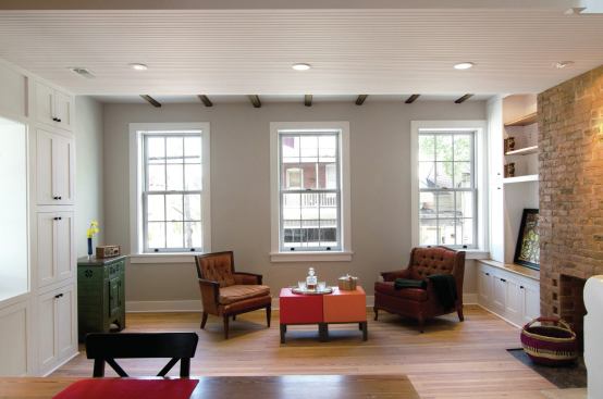 Ample built-ins provide storage and leave the floor space open so rooms seem bigger. The built-ins also minimize the need for furniture so stone and brick walls can be left exposed.