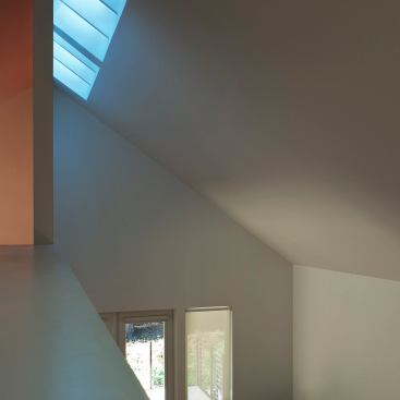 Skylights flood interior spaces with light, while drawing the eye upward to emphasize the tall ceiling heights.