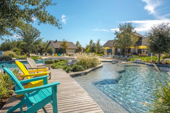 Sienna: The newest of four resort-style recreation complexes, Sawmill Lake Club features a pool by a lake.