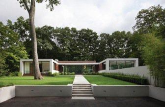 The outdoor kitchen of New Canaan, Conn. house is hidden away from the front facade. 