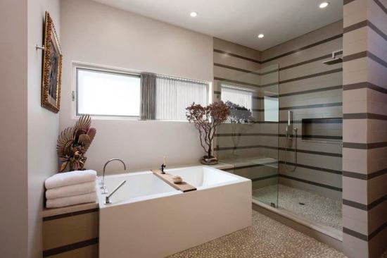 The bathroom floor uses the same pebble aggregate as in the living room. Floors have radiant heat.