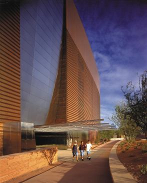 The Phoenix Central Library wears a skin of rusted steel with corrugations oversized to match its scale.