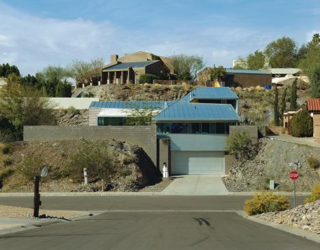 Built on a difficult infill site, the Hill/Sheppard Residence carves out private spaces and distant views amid a jumble of neighboring buildings.