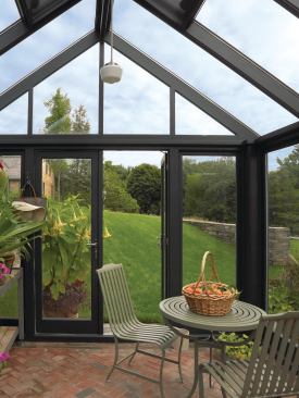 At the Longmeadow residence, a custom greenhouse accompanies the vegetable garden.