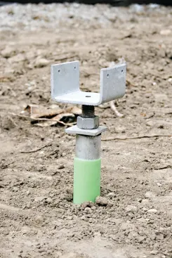 Several types of caps are available to attach piers to framing; some are adjustable in order to fine-tune the elevation.