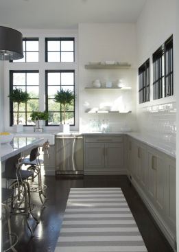 The materials and layout are inspired by English manor style, but updated with contemporary touches. 
