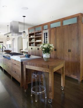The roll-away work block can do double duty as a seating area for guests--or for a busy food blogger to sit and jot notes during recipe testing.
