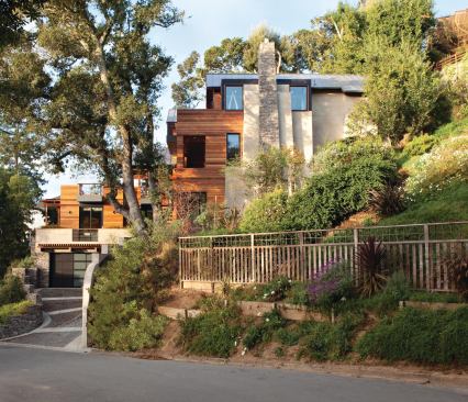 Nestled into the hillside, 20% of the structure reaps the ground's natural insulative benefits. 