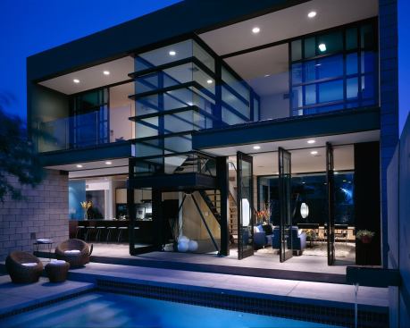 While the back wall is practically all glass facing the private pool courtyard. 