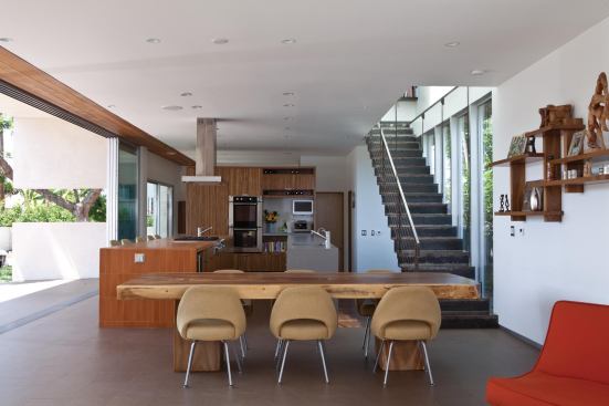 2012 Kitchen/Merit: Appleton Living, Venice, Calif., by Minarc, Santa Monica, Calif.   With upper cabinets limited to a single end wall, the kitchen opens to light and views along its two outside walls.