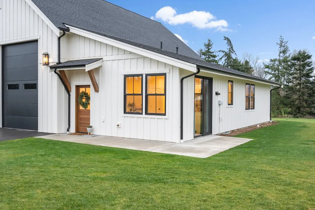 ADU house plan with workshop and large garage, side exterior.